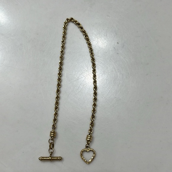Beautiful 14 kt yellow gold rope bracelet heart toggle closure. Approx 2.46 g. - Picture 5 of 13